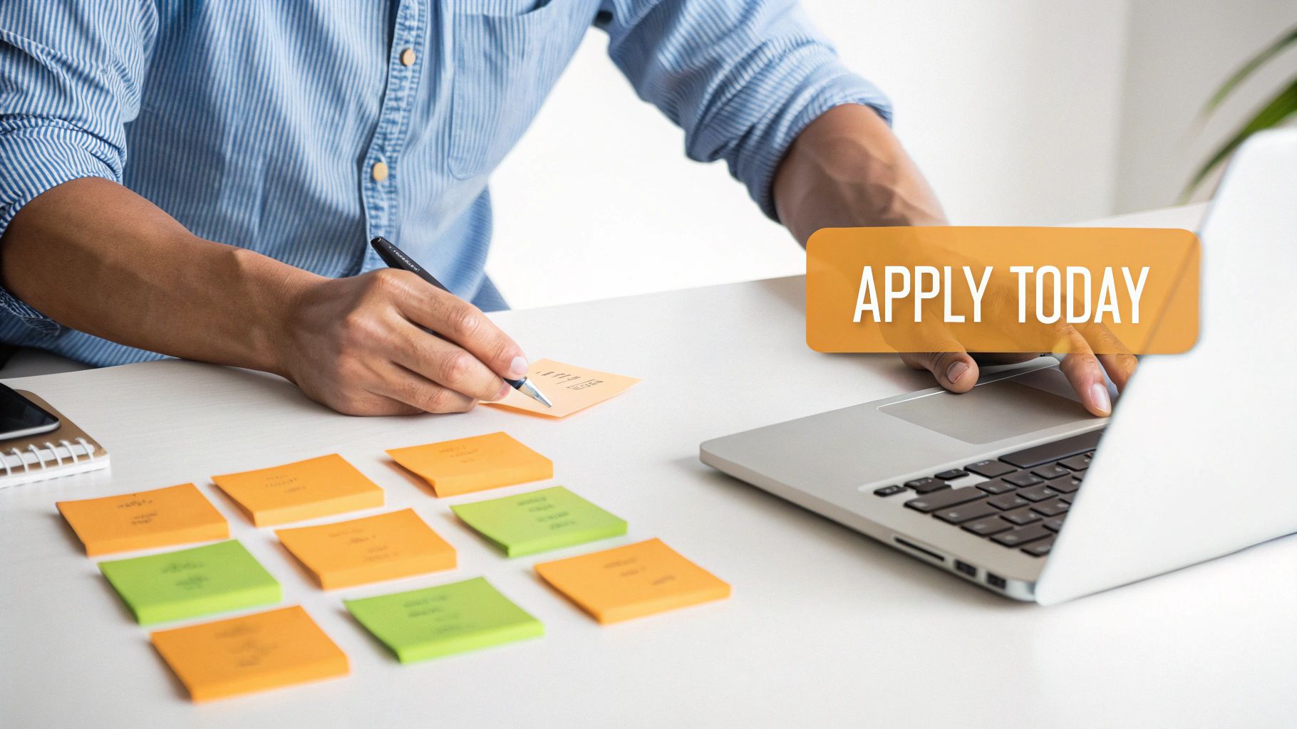 Person writing on sticky notes beside laptop with apply today button for productivity planning